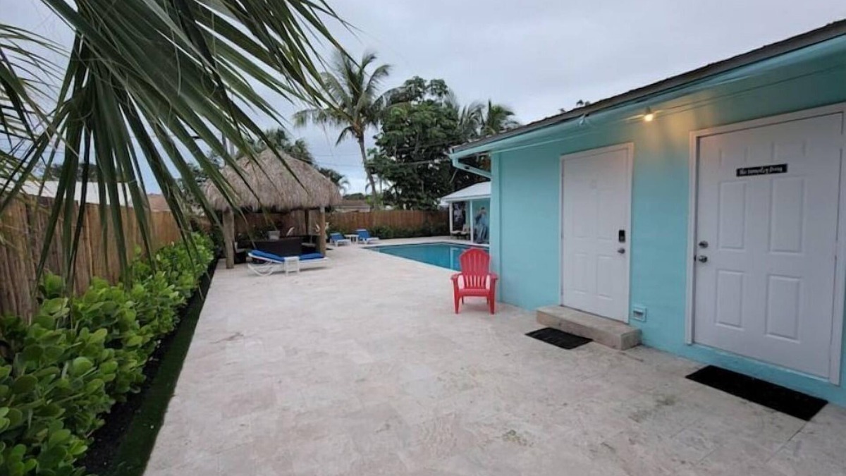 Tequesta Apartment | New Bedroom, Kitchen and Bathroom with a Pool