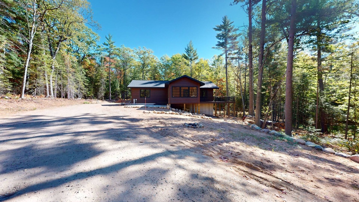Land O Lakes House | New Build-Serene Wooded Home with WIFI, Gas Grill, Near Lakes & Trails