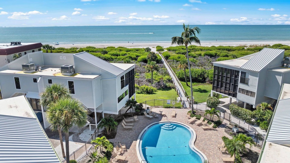 Sanibel House | New Cyprina Unit #2 – a fully renovated, Serena & Lily–inspired townhome on Sanibel’s sought-after East End. This luxury beach retreat seamlessly blends coastal elegance with modern comfort, offering breathtaking direct water views from every room.