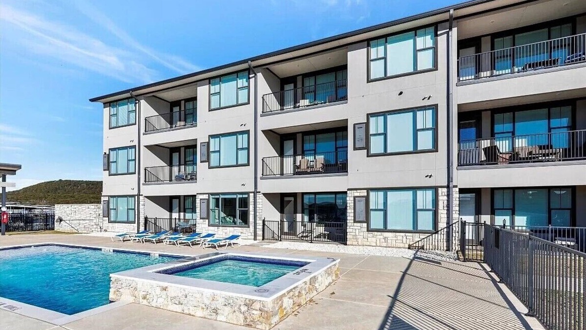 Graford Condo | NEW! First Floor Pool side PK Lake Luxury Condo - Hot Tub, FirePit, Gym, Laundry