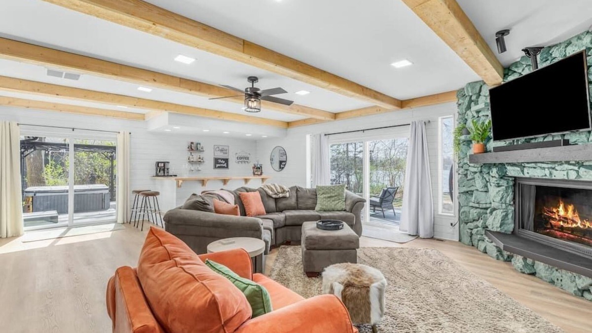 Commerce Township House | NEW Lake Front W/Private Dock, Hot Tub & Sauna!