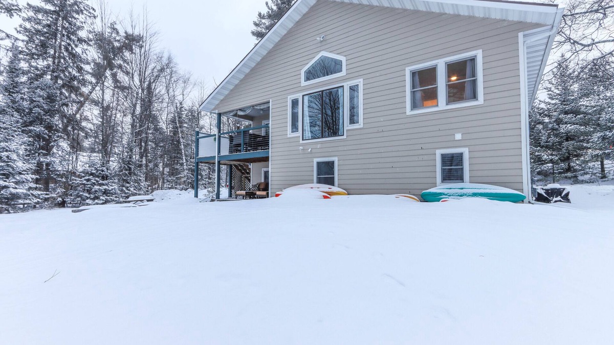 Arbor Vitae House | New Lake Home w Water Toys & Game Rm! In Town & On Snowmobile Trails