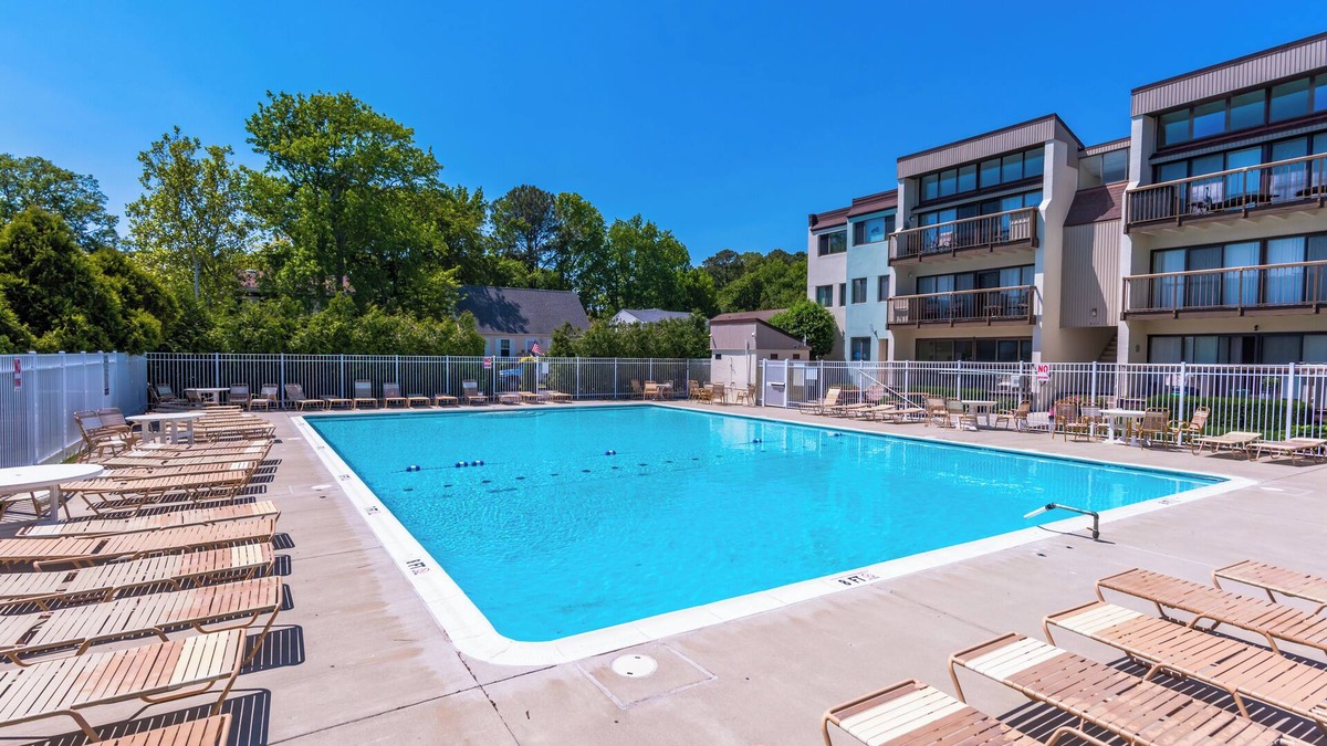 Caine Woods Condo | NEW LISTING as of 5/30/24 with pool + tennis courts too!nSpacious and ALL new!