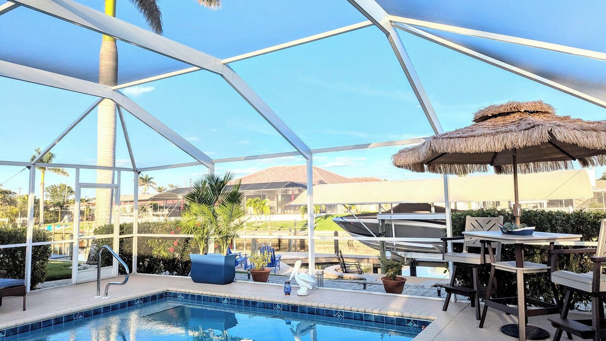 Eight Lakes House | NEW LISTING Waterfront Canal Tropical Oasis Immaculate Home