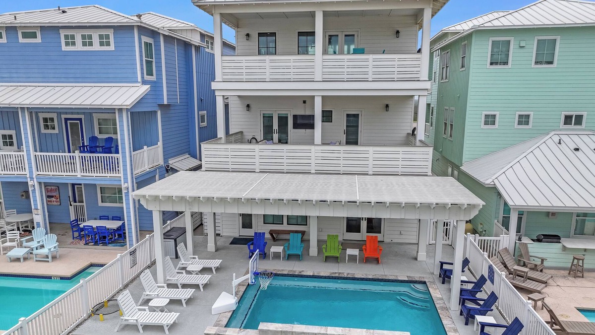 Port Aransas House | New, modern coastal home with beach views, pool, elevator & putting green!
