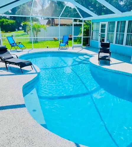 Bradenton House | NEW Renovated luxury home with private heated pool, game room Near Anna Maria Island and IMG