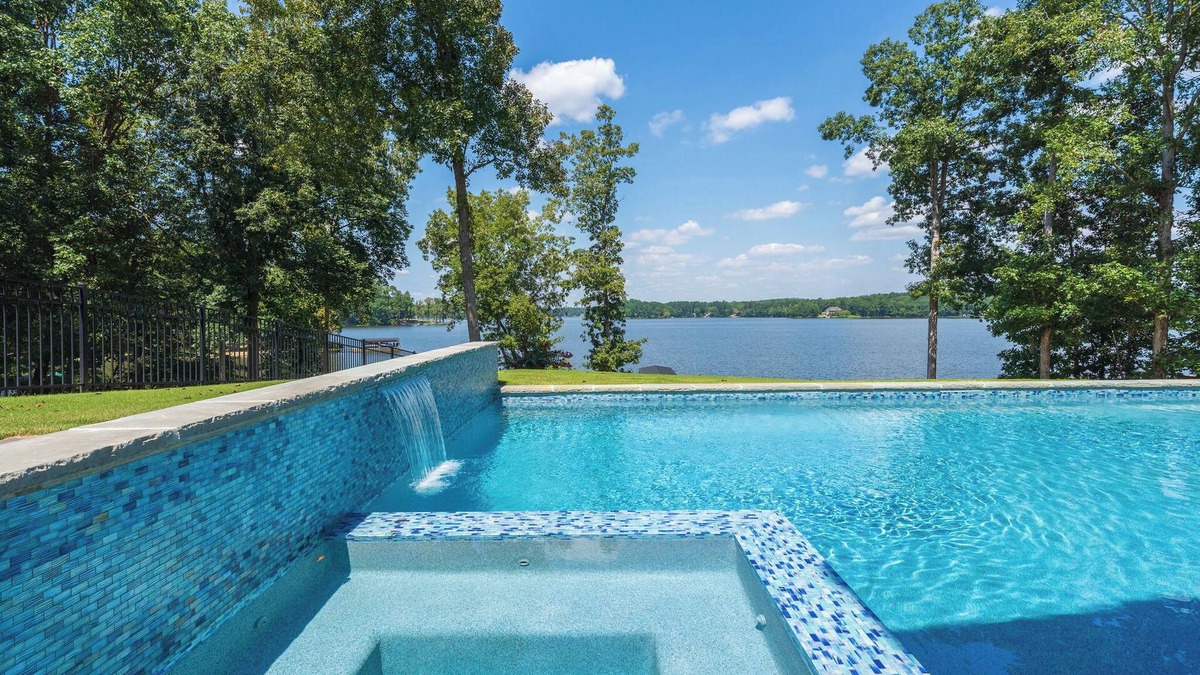 Buckhead House | NEW Stunning Lakefront Heated Pool Spa Game Room Putting Green Dock