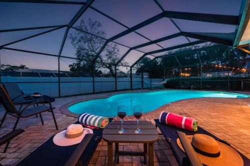 Palma Sola House | NEW Sunshine Getaway Heated Pool Hot Tub Games Villa