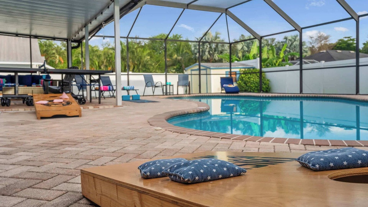 Palma Sola House | NEW! Sunshine Getaway! Heated Pool, Hot Tub, Games
