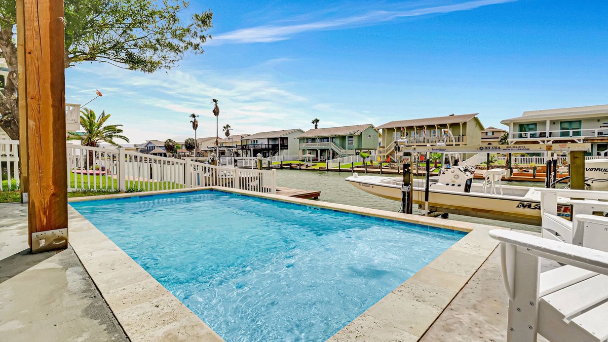 City-by-the Sea House | Newly constructed, canal-front home with private dock, covered deck, pool & W/D