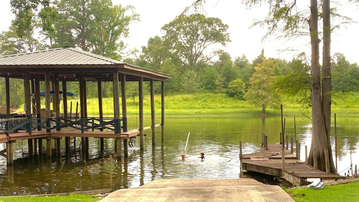 Negreet House | Newly Renovated Lakefront home with boat house, launch and 2 piers!