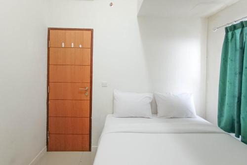 Panakkukang Apartment | Nice and Homey 2BR at Vida View Makasar Apartment By Travelio