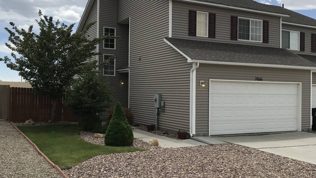 Rock Springs House | Nice, quiet townhouse with garage. Nicely landscaped and fenced in backyard.