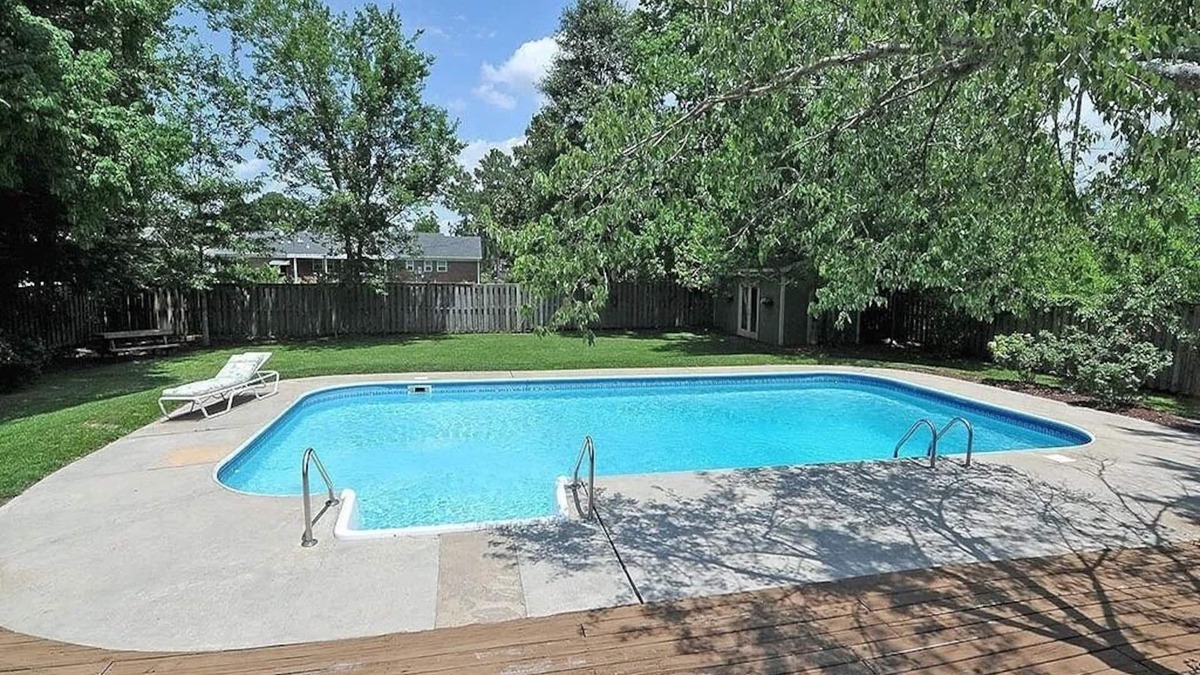 Wilmington House | Oasis in the middle of town for large groups with pool and 2 Master bedrooms.