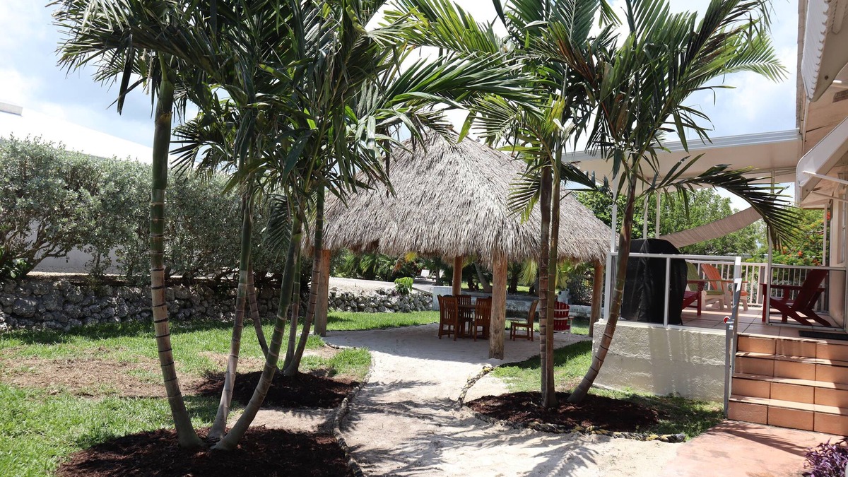 Cudjoe Gardens House | Oceanside, pet friendly, smart home with plenty of paddle equipment