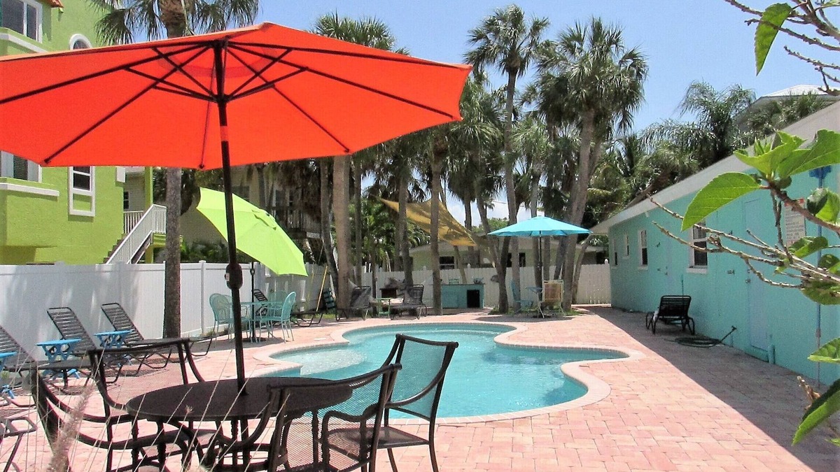 Holmes Beach Apartment | One bedroom 1 bath, pool, steps to Beach! Rent one unit or all three!