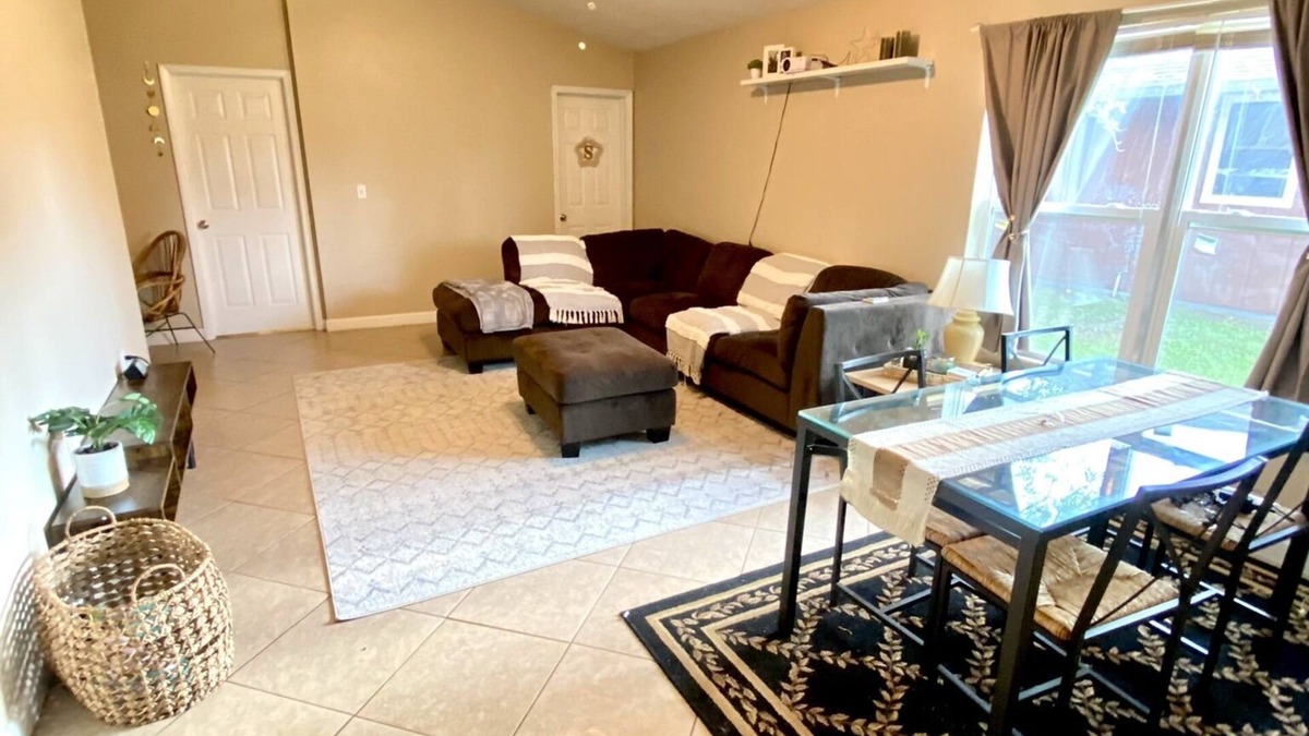 Poinciana House | One bedroom with designated parking space at Kissimmee