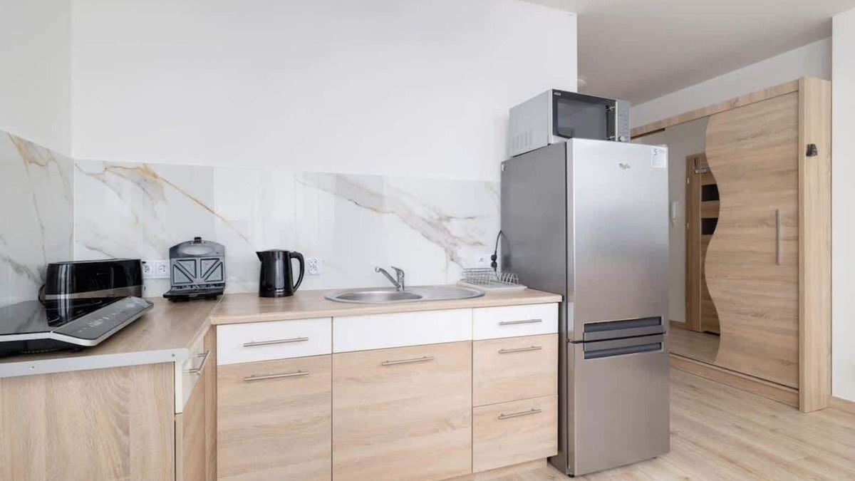 Wieliczka Apartment | Os Szymanowskiego 18 Trendy Apartment Parking