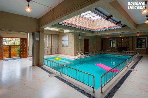 Panchgani Villa | Otonia by StayVista with Indoor swimming pool, Modern interiors & a mix of indoor & outdoor games