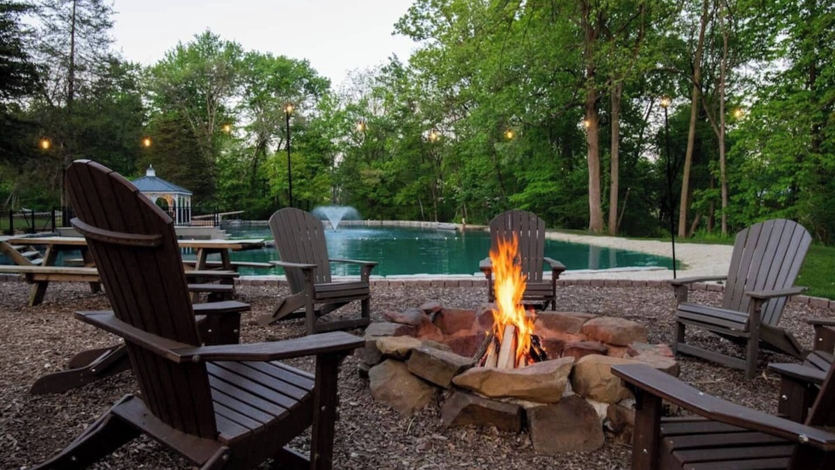 Honey Brook House | Outdoor Oasis with pickleball, swimming pond, basketball, shuffleboard & pavilion with kitchen