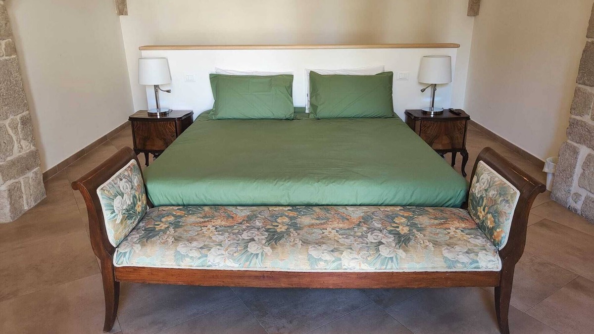 L'Aquila House | PALAZZO PASCALI suite in the historic center of L'Aquila with garden view