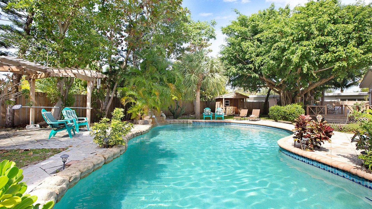 Parrot Cove House | Palmway Tropical Oasis - Heated Pool, Beach & Golf