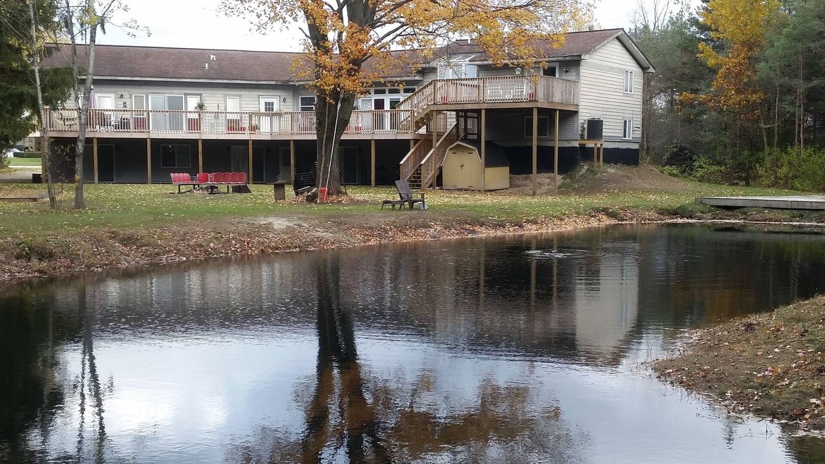 Norton Shores Apartment | Paradise Cove Main 5 Br/2 Baths ~ Sleeps Up To 24 ~ Pond, WIFI, Central AC