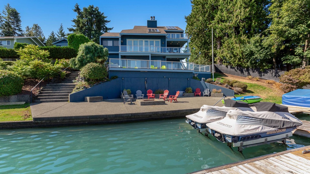 Bonney Lake House | Peaceful lakefront home with firepit, hot tub, pool table, dock, balcony, & deck
