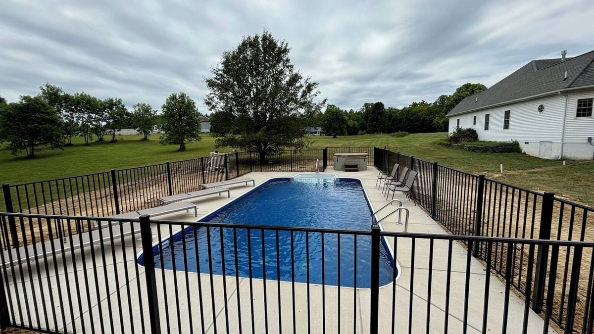 Livingston House | Peaceful, lakeside retreat-private pool, hot tub, private dock, boatslip & more!