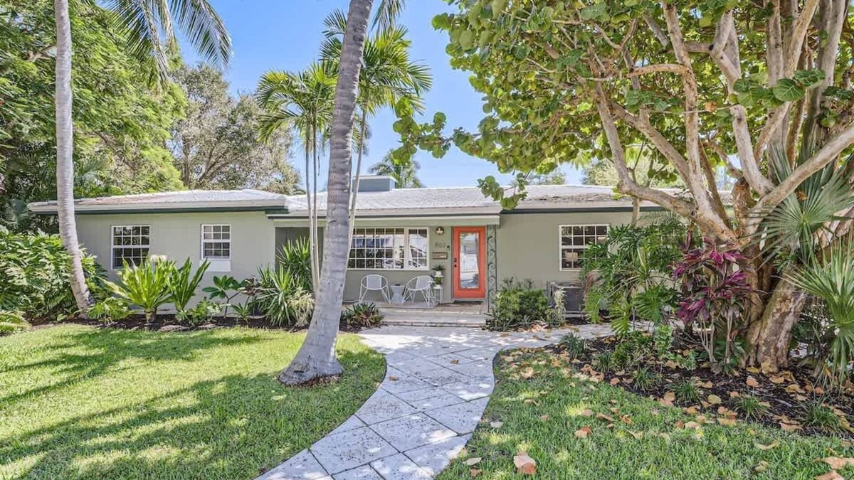 Parrot Cove House | Peacock Oasis - Retro Vibes and Poolside Lounging in Parrot Cove