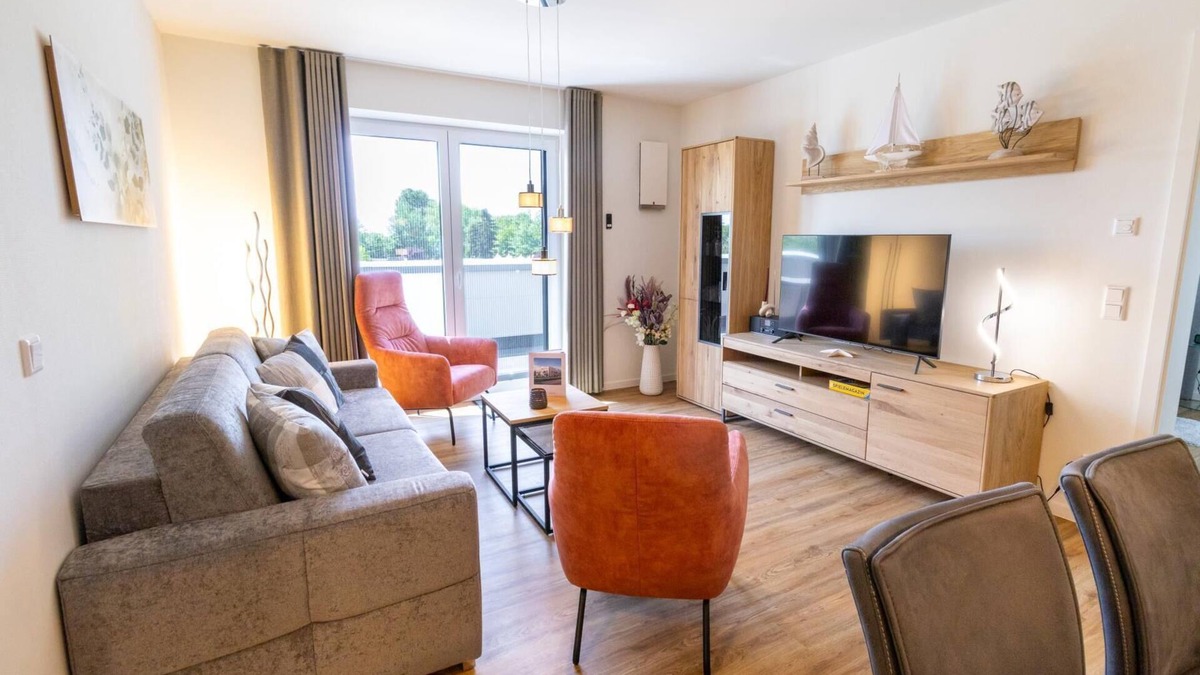 Tossens Apartment | Penthouse Meeresrauschen - light & air. Roof terrace. Elevator. Close to the beach.