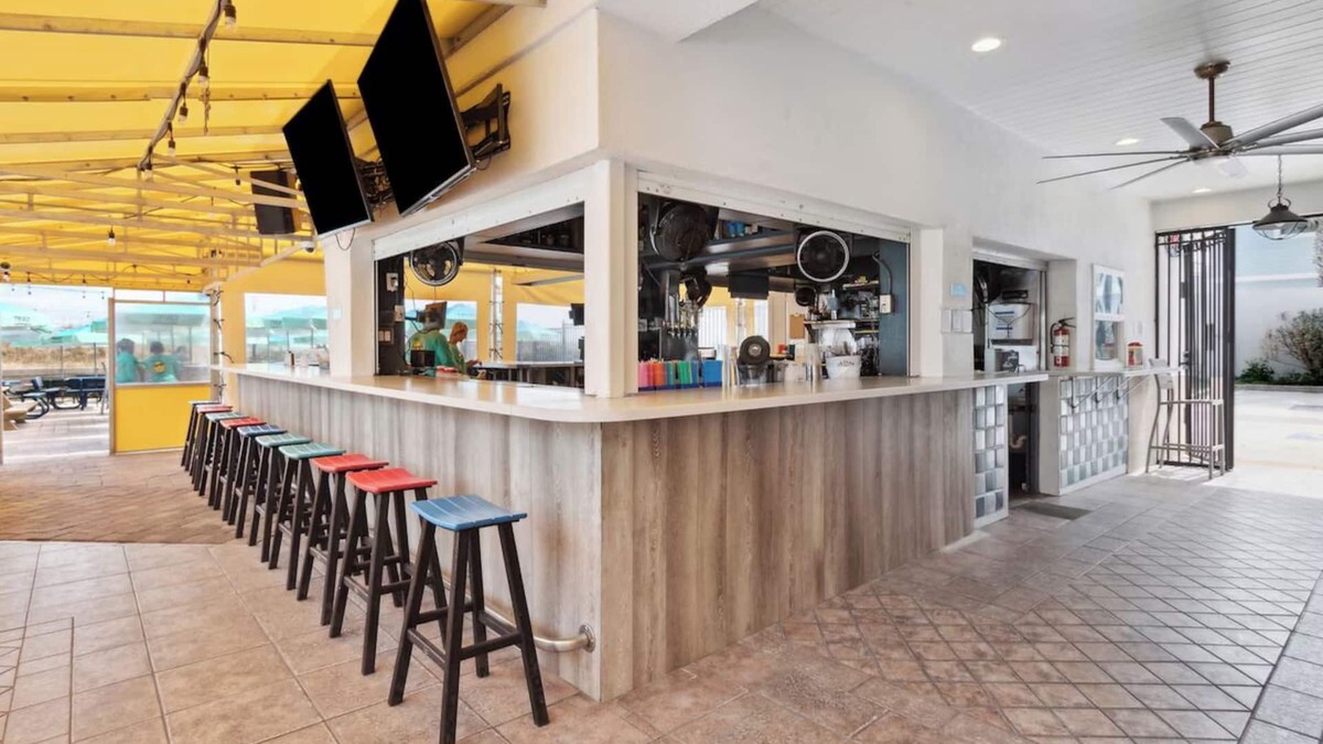 Neptune Beach Hotel | Perfect Beach Getaway: 4 Family Rooms, Outdoor Pool & Pet-Friendly