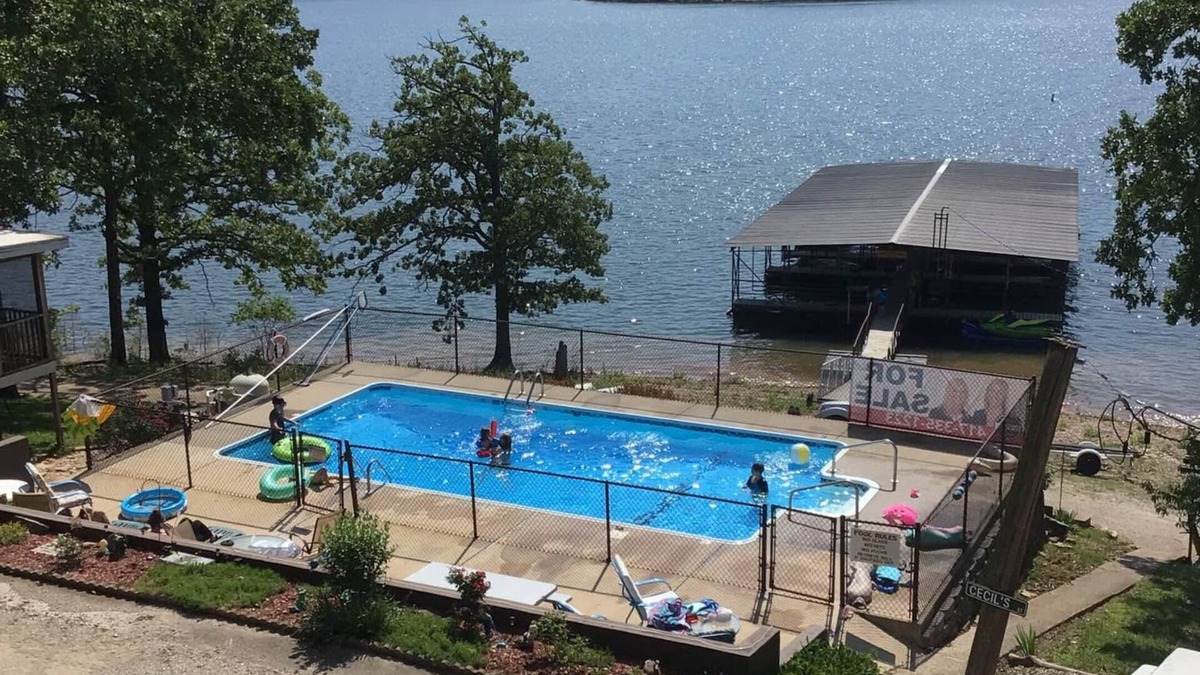 Boulder Point Cabin | Pet friendly waterfront cabin with screened in deck overlooking lake! Boating