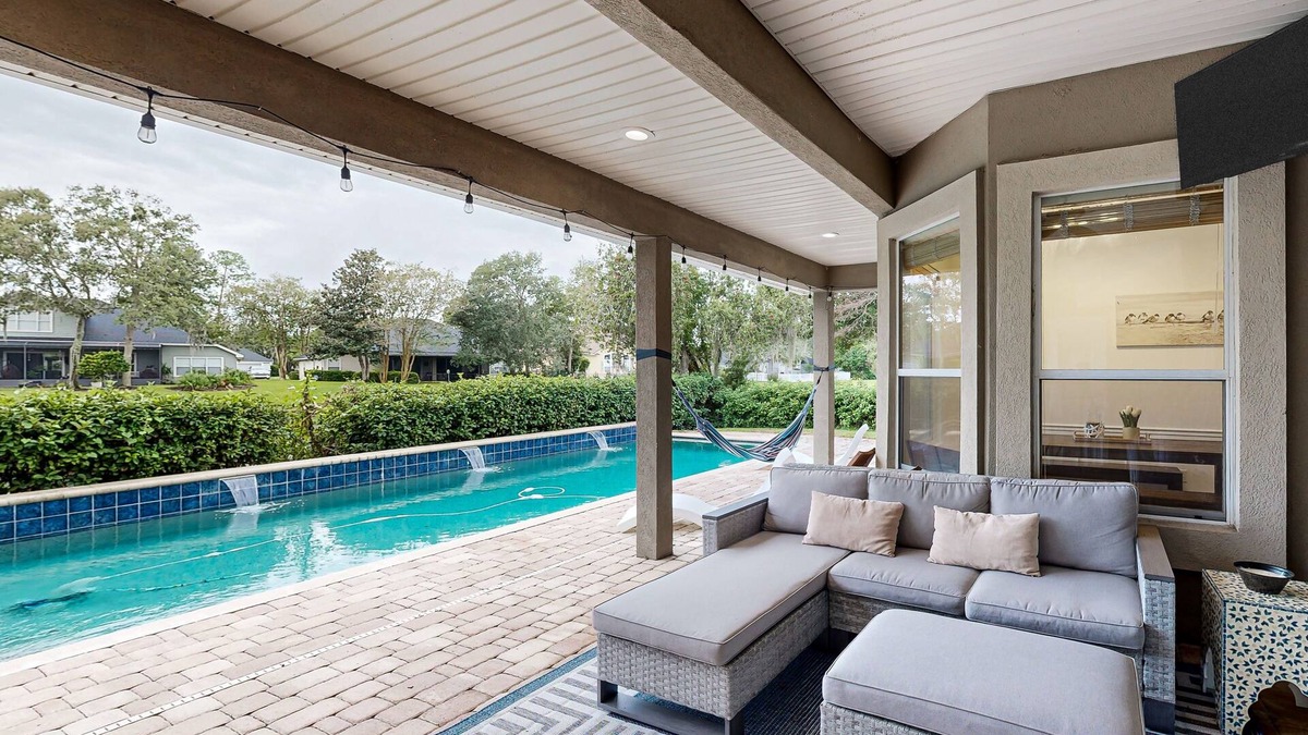 Fleming Island House | Picture-perfect getaway with saltwater pool, outdoor bar, grill & soaking tub