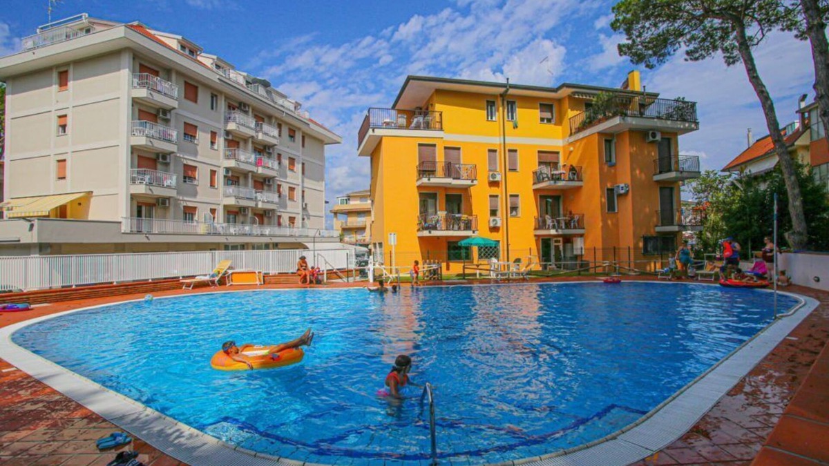 Eraclea Mare Apartment | Pine forest front apartment with swimming pool max 5 people wi-fi
