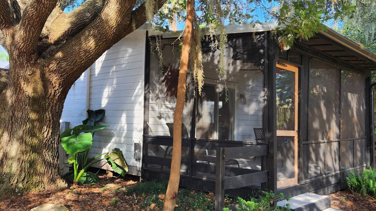 Eustis Cottage | Pine Forest Studio, serene winding lane to cozy retreat.