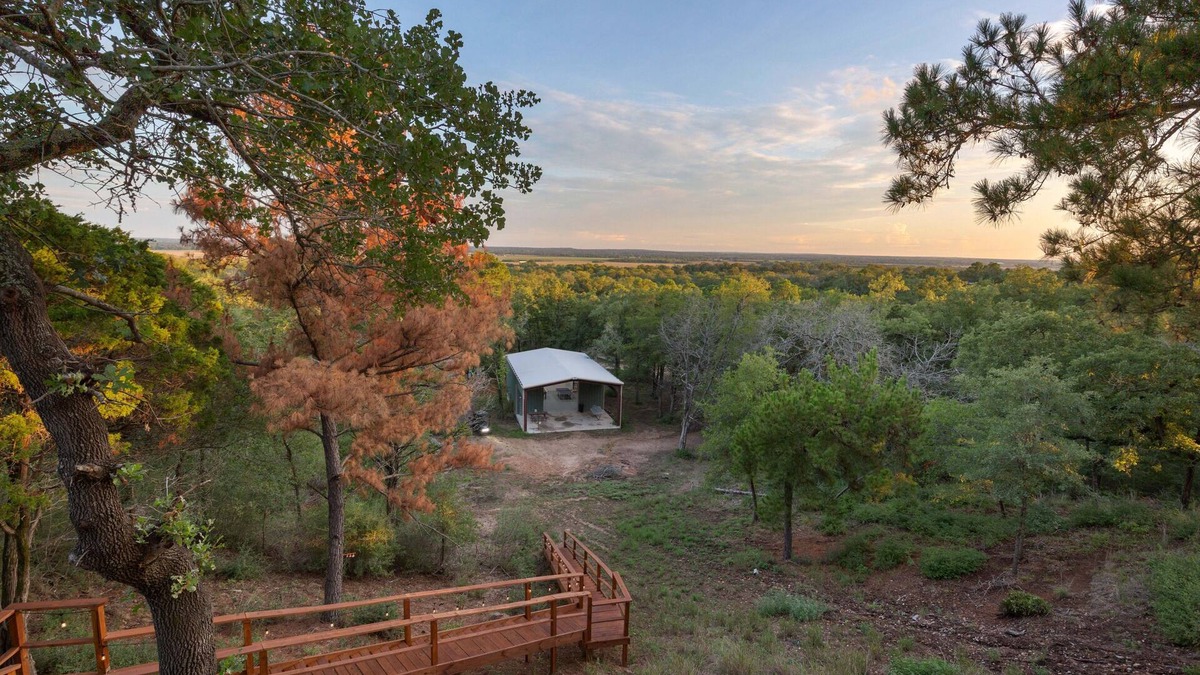 Bastrop House | Pine Top View with the Club House, Sauna, Pool
