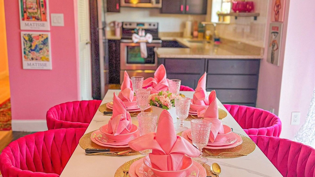 Lake Ozark House | Pinkie’s Paradise is the ultimate Lake of the Ozarks girls’ retreat! 2BR/2BA villa with a movie room, sauna, private deck, firepit, and pool access. Perfect for bachelorettes, birthdays & unforgettable lake getaways!