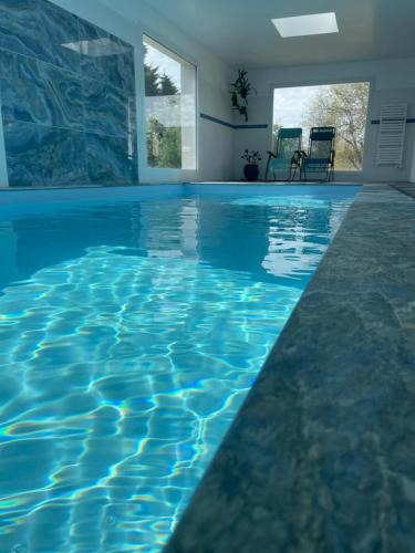 Benodet Villa | Plage à 300 m, piscine 29 degrés, 5 chambres, 4 sdb, calme