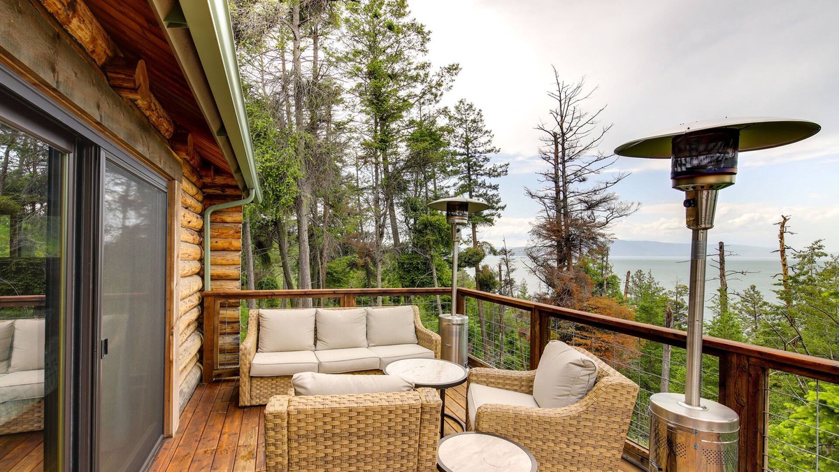 Finley Point Cabin | Polson Cabin Rental: Private Deck & Mountain Views