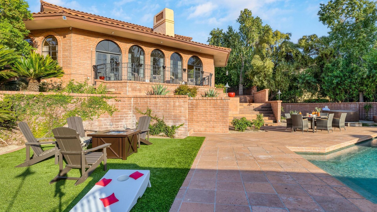 Turquoise Hills House | Pool, Firepit Lounge, Cornhole, and Outdoor Kitchen + Dining Area | Diamondback
