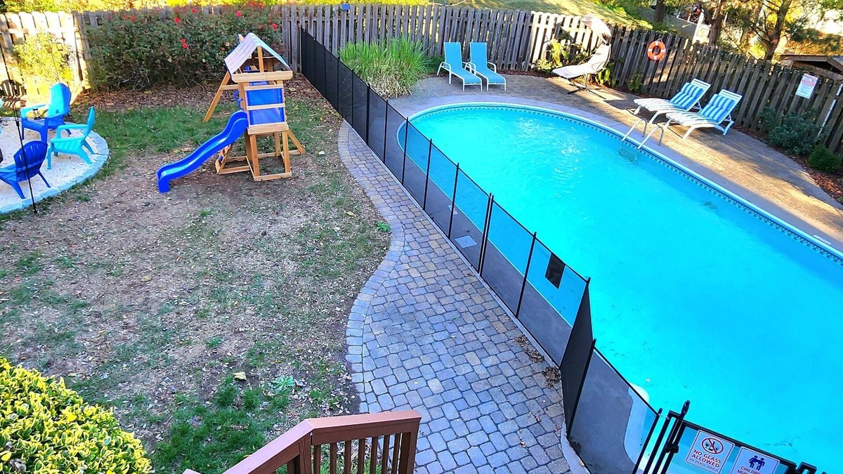McAlpine House | Poolside Retreat - spacious 4-bedroom retreat with pool, hot tub, gym and more
