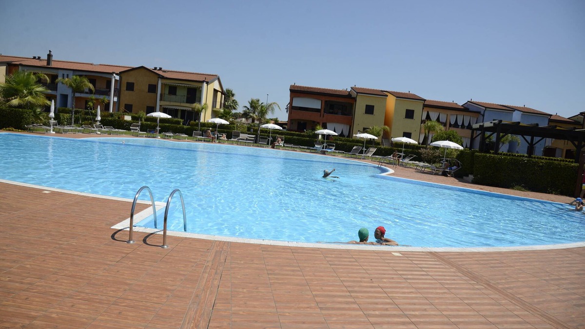 Lido Condo | POSEIDONE-Refined apartments in village with swimming pool