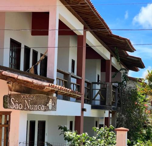 Una Hotel | Pousada São Nunca