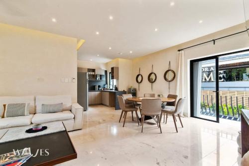 12th Street Apartment | Prime 5th Ave Stay - 4BR with King Beds & City Views