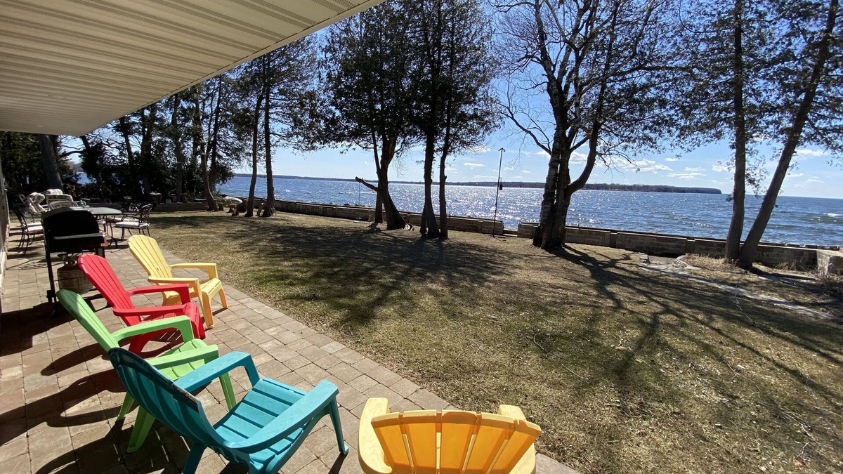 Little Sturgeon House | Prime sunsets, great kayaking, huge yard, volleyball court, and free firewood