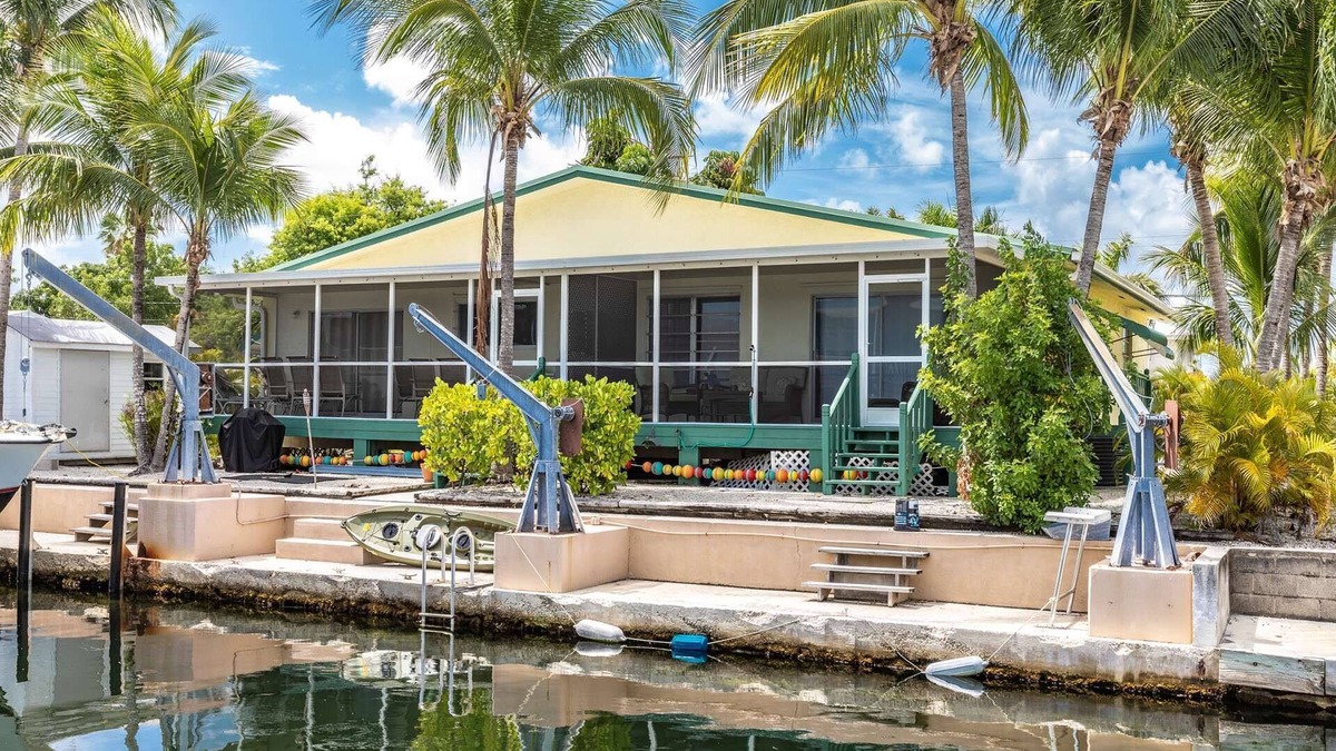 Pine Channel Estates House | Prime Time 2: Charming Canal Front Duplex, Your Gateway to South Pine Channel & Atlantic/Gulf Waters