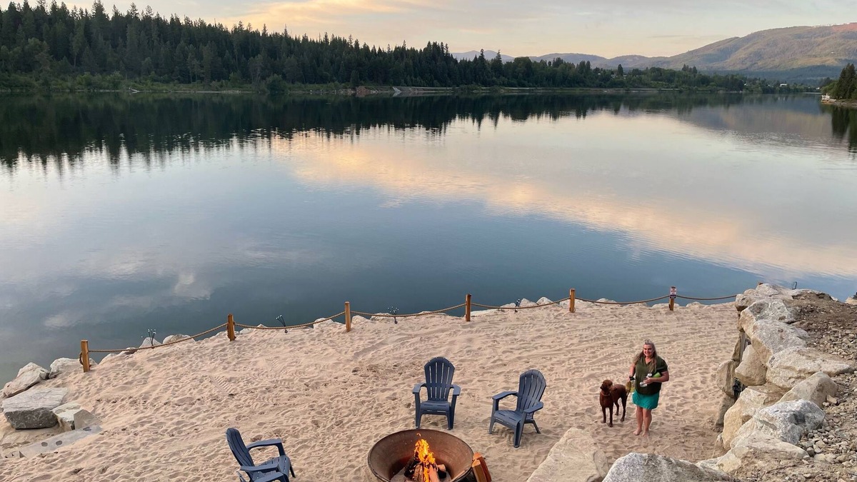 Priest River House | Private Cove River Home with water toys, 200 foot sandy beach and boat dock.