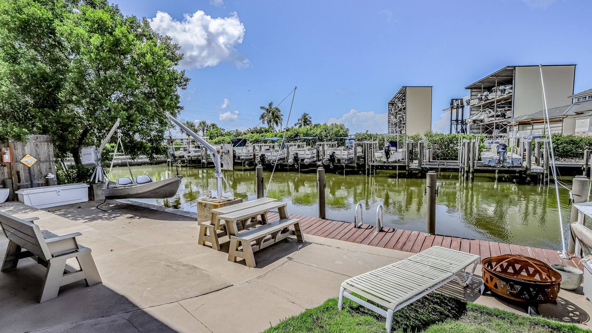 Goodland House | Private Dock, Boats & Bikes Charming Canal-Side Condo w/Screened Porch