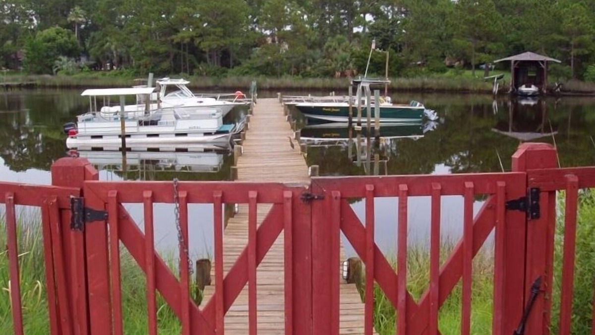 Thomas Drive Condo | Private Dock - Ground Floor - Poolside - Walk to the Beach